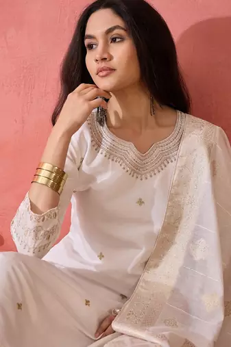 Women's white colour kurta set pants stitched and woven dupatta set