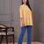 Mustard floral printed flared pamplum top