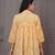 Mustard floral printed flared pamplum top