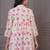 White & red floral printed flared pamplum top