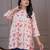 White & red floral printed flared pamplum top