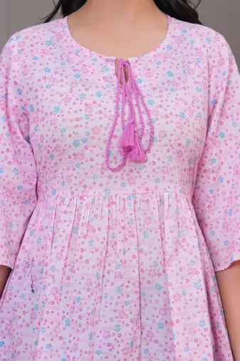 Baby pink floral printed flared pamplum top