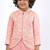 Peach embroidered satin jacket paired with pant