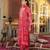 Women red silk blend ikat embroidered straight kurta trousers with dupatta