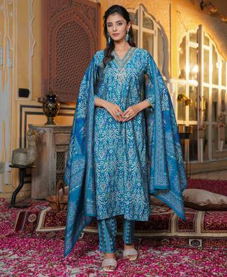 Women blue silk blend ikat printed straight kurta trousers with dupatta 3