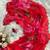 red foral printed chiffon saree with hand work with stitched blouse