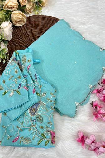 sky blue crunchy silk blend saree with hand work