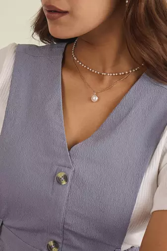 Lavender solid pinafore dress with button