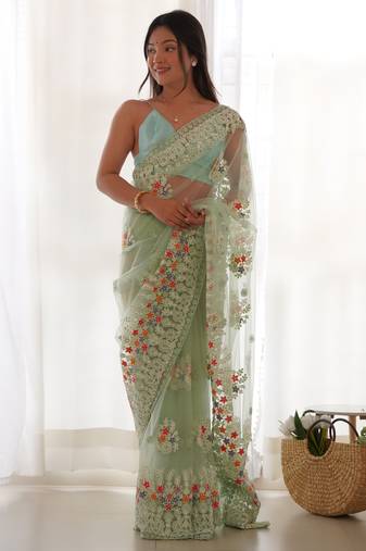 Glamourous light sea-green multi color thread and aari embroidered with stone work butterfly net fabric indian saree