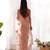 Glamorous light peach multi color thread and aari embroidered with stone work butterfly net fabric indian designer saree