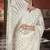 Dazzling off-white tone to tone aari embroidered with stone work butterfly net fabric indian designer saree