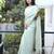 Alluring light green zari dori, and thread embroidered with real mirror work platinum crush fabric indian designer saree