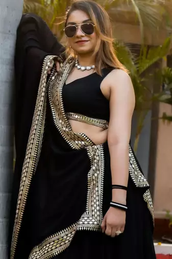 Pretty Black Heavy Lace Work Georgette Reception Wear Lehenga Choli