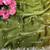 green satin silk blend embroidered saree with stitched blouse