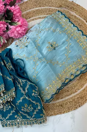 jimmi choo silk blend sky blue heavy embroidered saree with stitched blouse