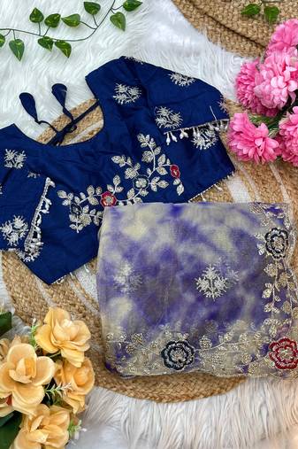 abstract printed blue twile net saree with stitched blouse