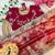 abstract printed red twile net saree with stitched blouse