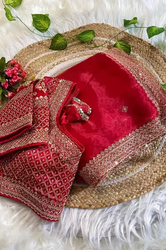 jimmi choo red heavy embroidered saree with stitched blouse