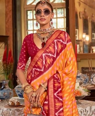 Orange silk blend printed saree with unstitched blouse 4