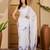 white satin georgette printed saree with unstitched blouse