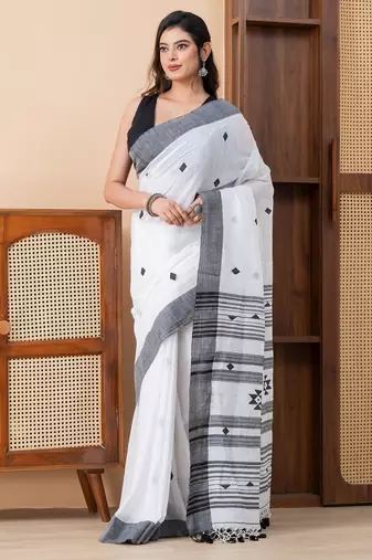 White khadi cotton with heavy jamdani palla and tassels saree