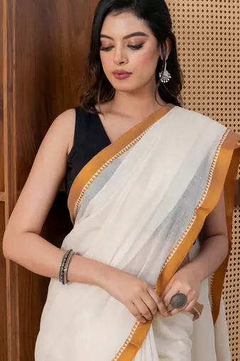 Cream handloom dhaniakhali pure cotton with sleek golden border saree