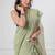 Light green khadi cotton all over stripes and tassels saree