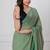Light green handloom mark mul cotton all over small checks with tassels saree