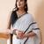 White solid mul cotton with dual stripes and tassels saree