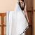 White solid mul cotton with dual stripes and tassels saree