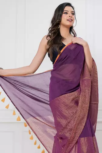 Purple solid mul cotton with zari stripes and tassels saree