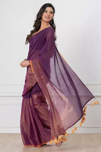 Purple solid mul cotton with zari stripes and tassels saree