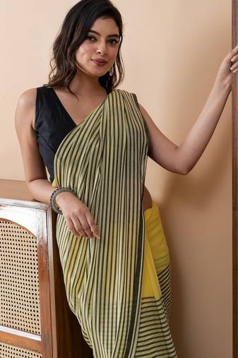 Yellow colorblocked mul cotton with stripes and tassels saree