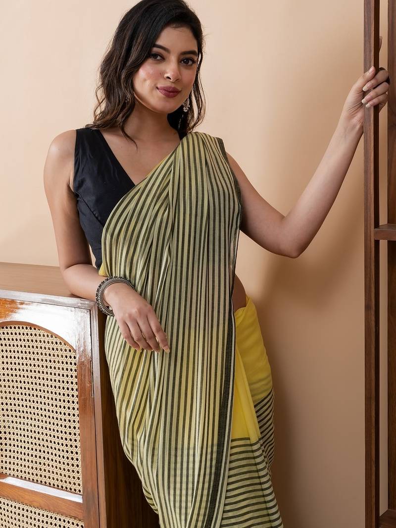 Yellow colorblocked mul cotton with stripes and tassels saree