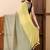 Yellow colorblocked mul cotton with stripes and tassels saree