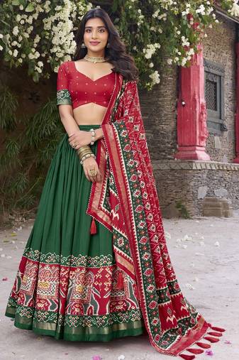green tussar Silk Lehenga Choli with Patola Print & Foil Shine