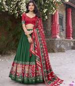 green tussar Silk Lehenga Choli with Patola Print & Foil Shine