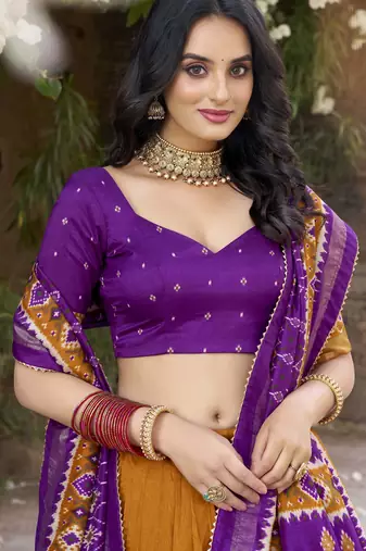 mustard tussar Silk Lehenga Choli with Patola Print & Foil Shine