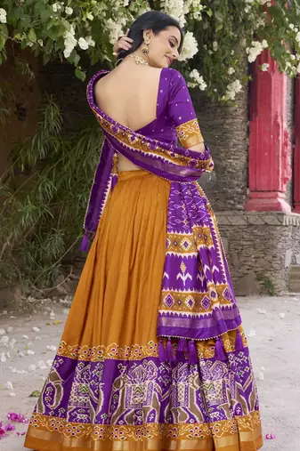 mustard tussar Silk Lehenga Choli with Patola Print & Foil Shine