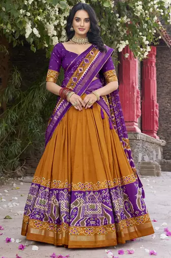 mustard tussar Silk Lehenga Choli with Patola Print & Foil Shine