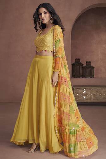 Yellow emboridered pure georgette jacket style sharara suit