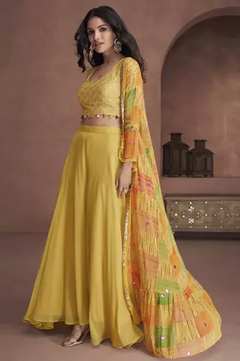 Yellow emboridered pure georgette jacket style sharara suit
