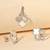 White cubic zirconia pendant set with floral design