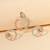 Rose gold cubic zirconia pendant set with dual-tone design