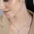 Rose gold cubic zirconia pendant set with dual-tone design