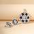 Oxidised cubic zirconia necklace set with textured blossom design