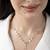 Heart cluster cz rose gold necklace with whimsical romance and layered charms