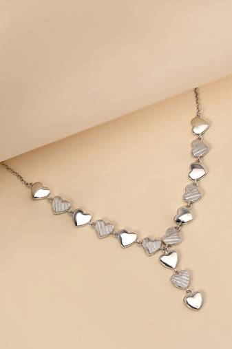 Heart cluster cz silver necklace with whimsical romance and layered charms