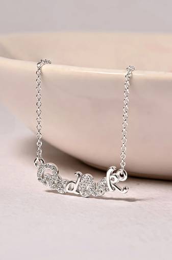 Engraved silver pendant necklace with 'good luck' inscription and sleek design