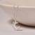 Half-moon cz silver pendant necklace with spike design and modern elegance
